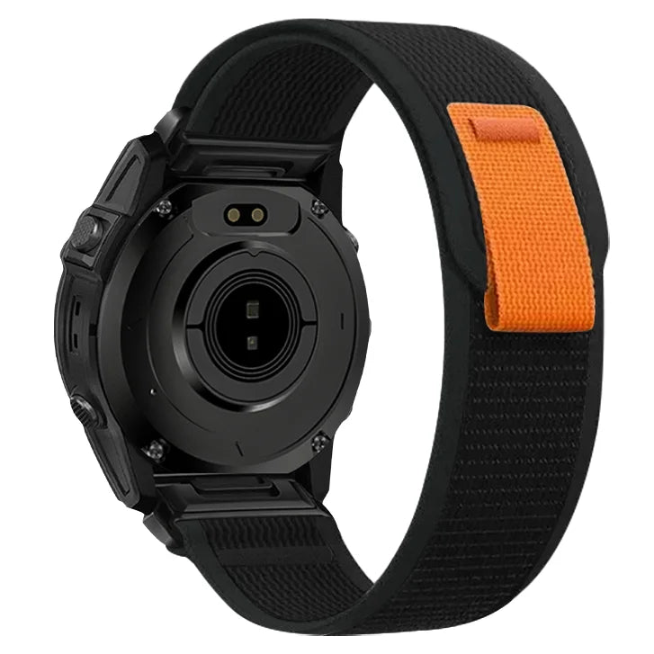 A black Garmin sports watch with an adjustable nylon strap shown from the side.