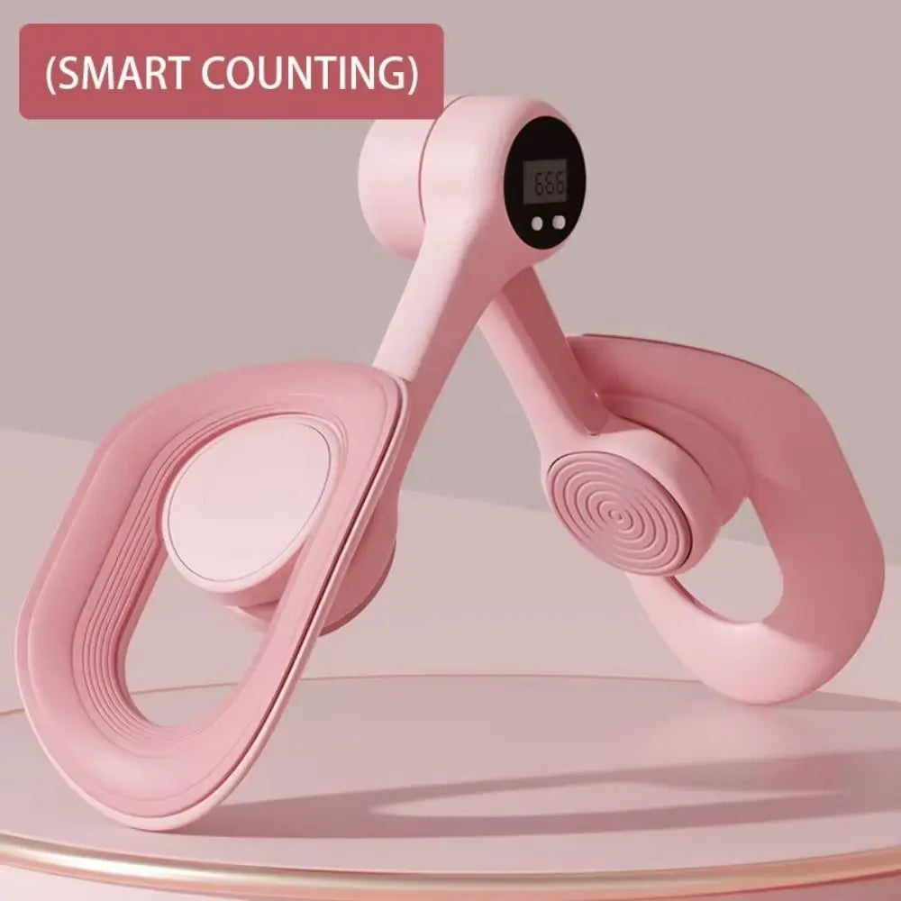 A pink thigh and hip strength trainer with a digital counter, shown in a close-up view.