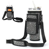 A black diamond accent water bottle carrying pouch with a strap and a straw is shown.