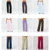 A collection of flared high-waist yoga and fitness pants in various colors including black, purple, light blue, pink, olive g