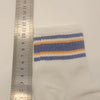 White casual socks with blue, orange, and gray horizontal stripes shown next to a ruler.