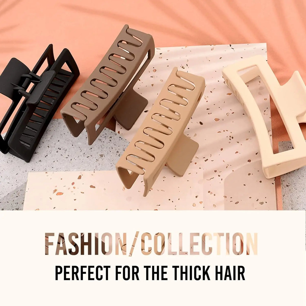A collection of four extra large matte claw clips for thick hair displayed on a light background.