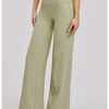 A model wearing high-waist wide-leg yoga leggings in olive green.