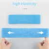 A hand is stretching a blue elastic headband, demonstrating its high elasticity.