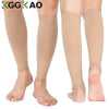 A pair of beige high-support leg compression sleeves shown on a person's legs.