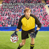 A male soccer goalkeeper wearing black uniform and black gloves is positioned on a green field with a soccer ball.