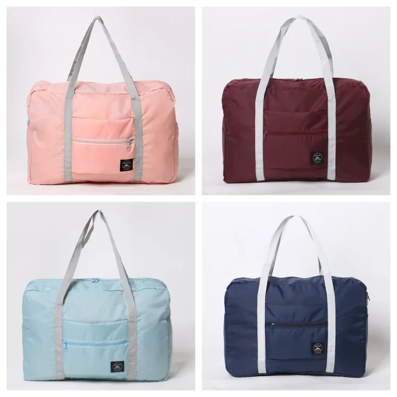 Three versions of a foldable travel duffel bag in pink, maroon, and blue fabric shown from the front.