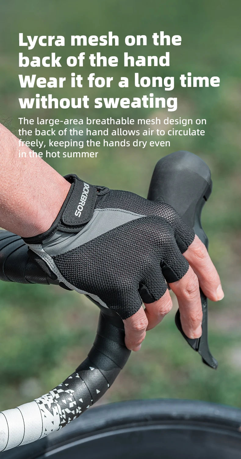 A hand wearing black Lycra mesh cycling gloves on a bicycle handlebar.