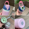 A pink insulated stainless steel thermos mug with a lid and straw is shown in various angles.