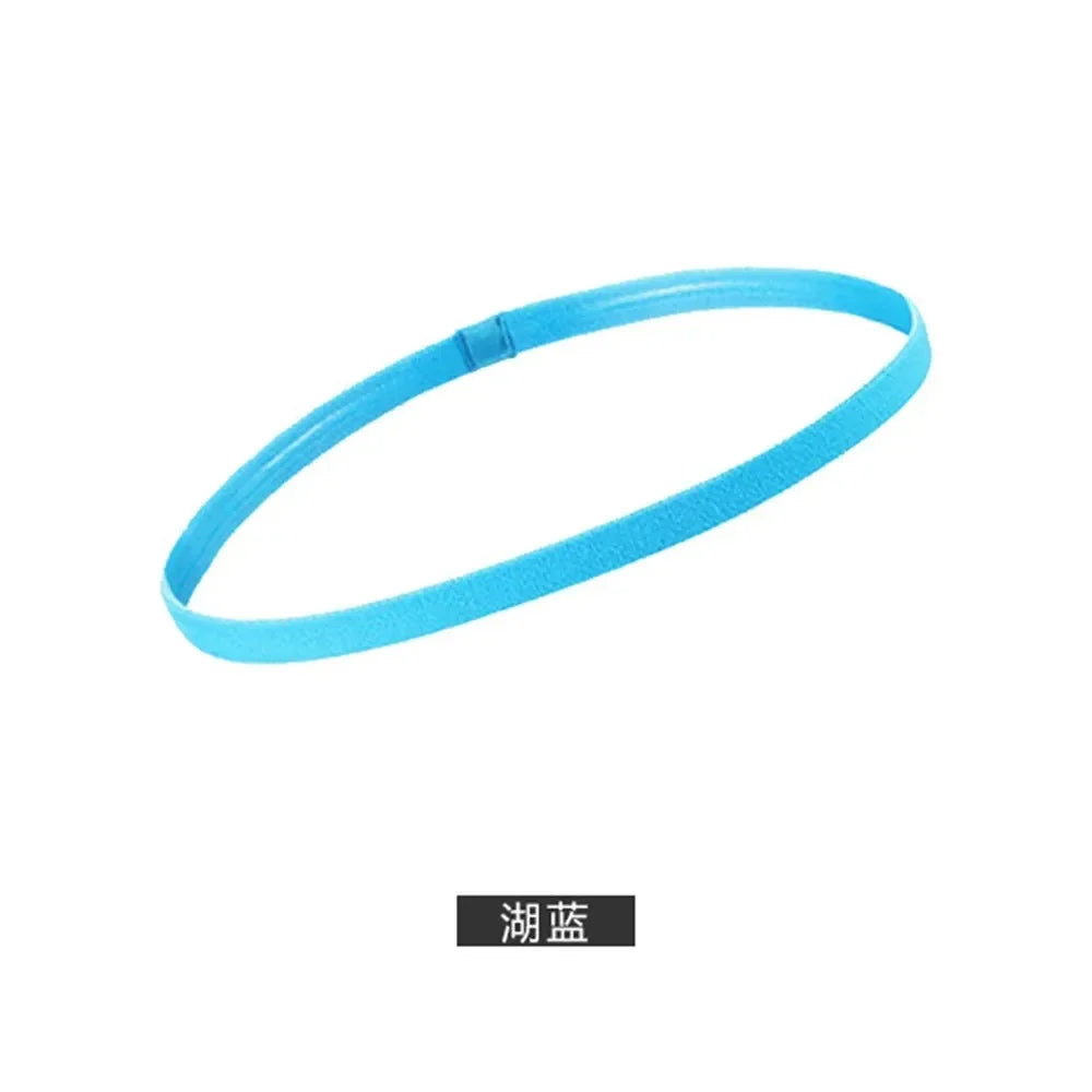 A blue elastic silicone sports headband shown in a loop.