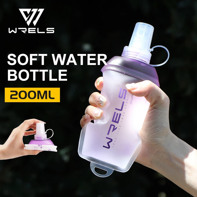 A hand holds a purple soft water bottle with a clear liquid, demonstrating its use for outdoor activities.