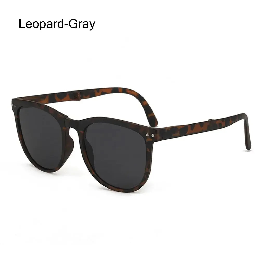 A pair of Leopard-Gray vintage oversized retro sunglasses with dark lenses and brown tortoiseshell frames.