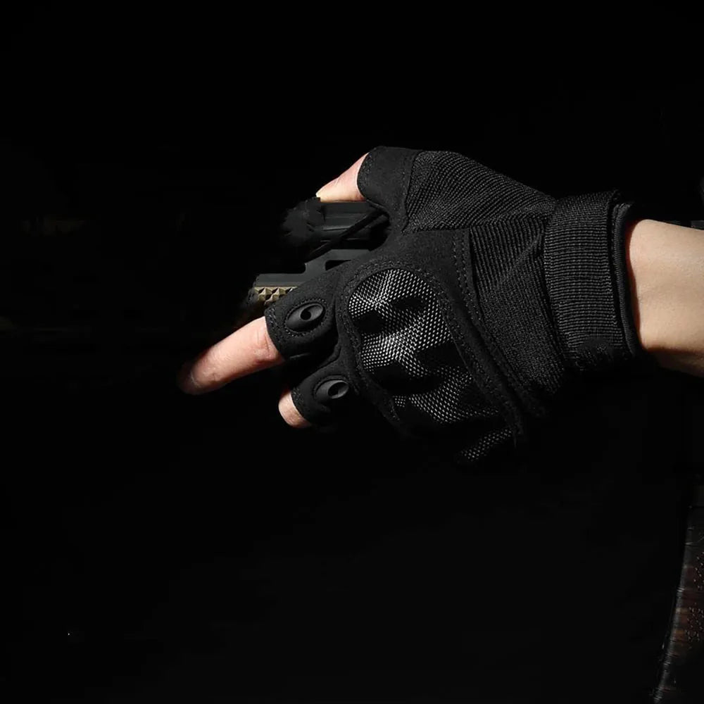 A hand wearing black tactical fingerless gloves is shown against a dark background.