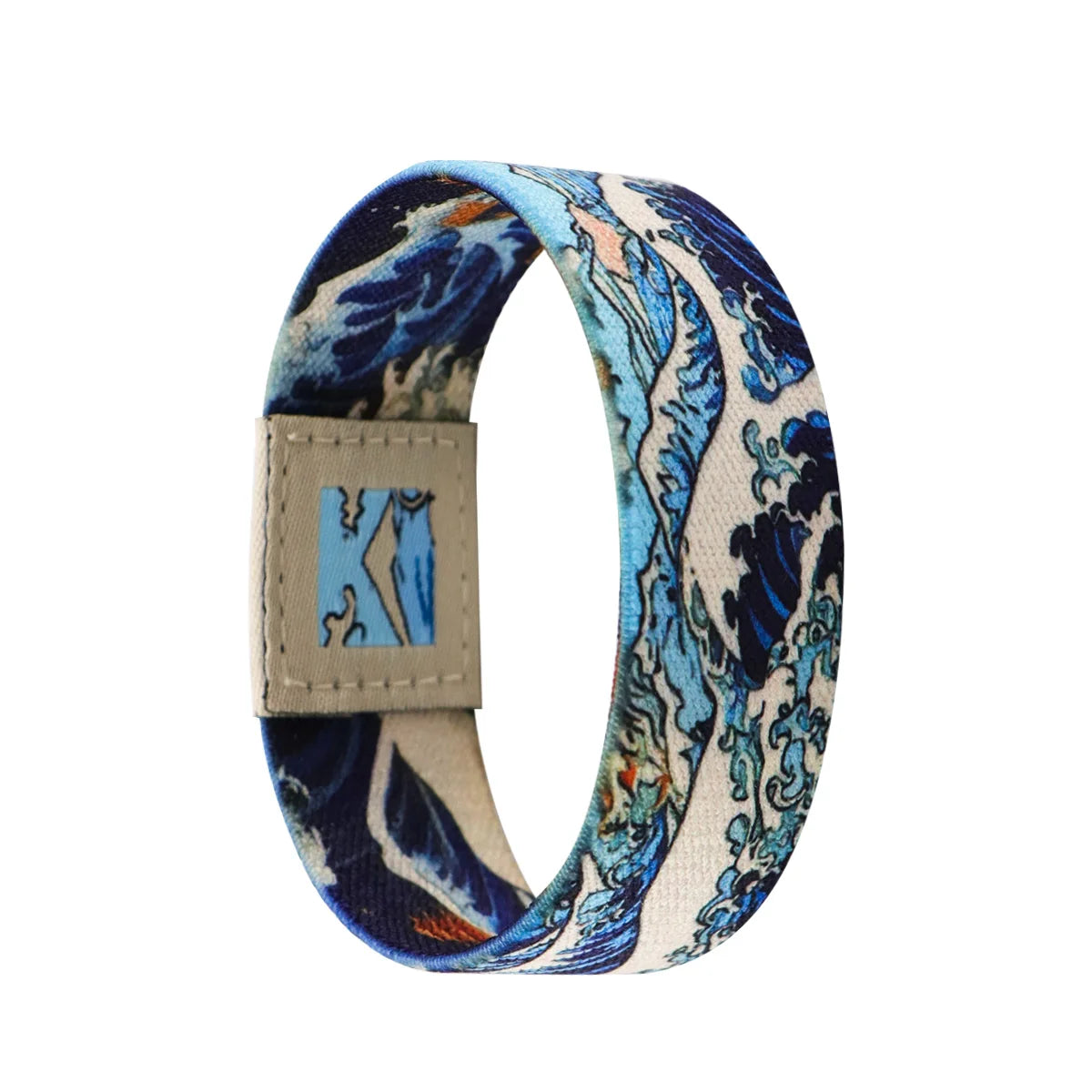 A blue and white patterned stretch silicone wristband bracelet with a square silver buckle.