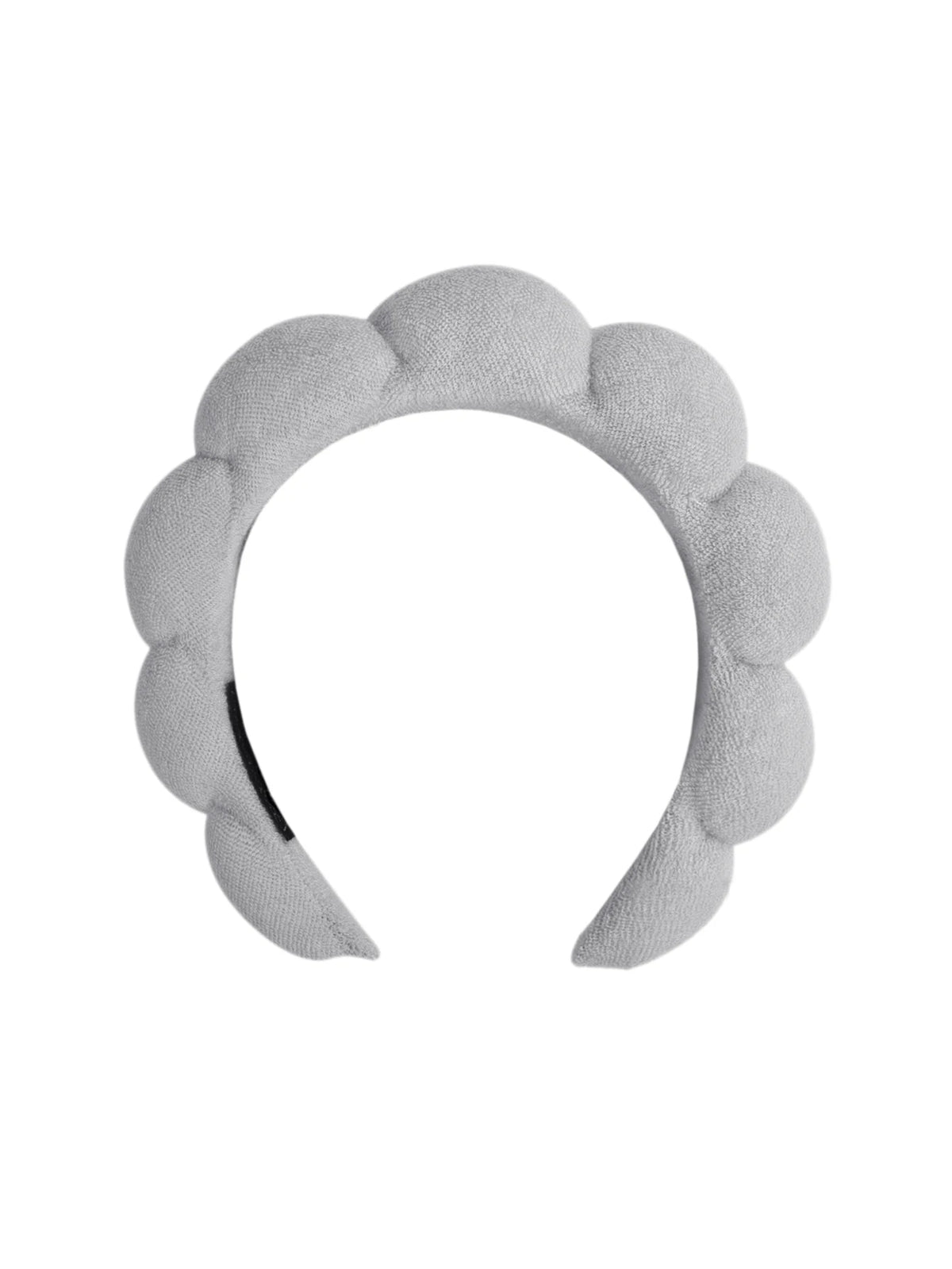 A light gray microfiber skincare headband and wristband set.