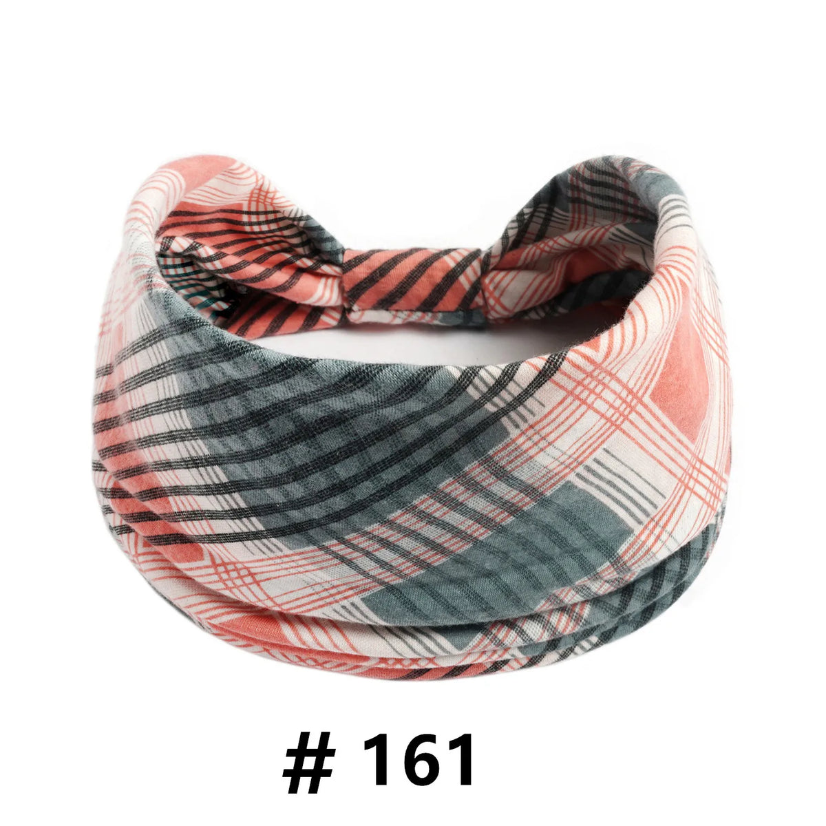 A rolled boho cotton turban headband featuring plaid patterns in shades of pink, gray, and black.
