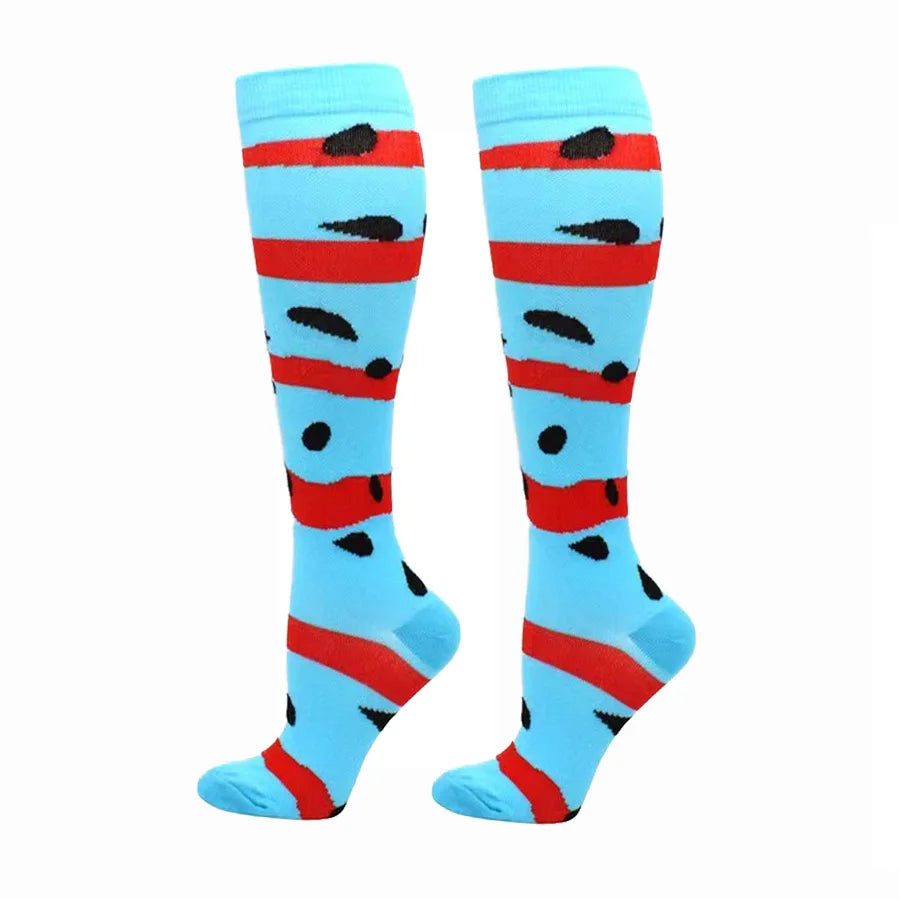Pair of blue compression elastic socks with red stripes and black spots