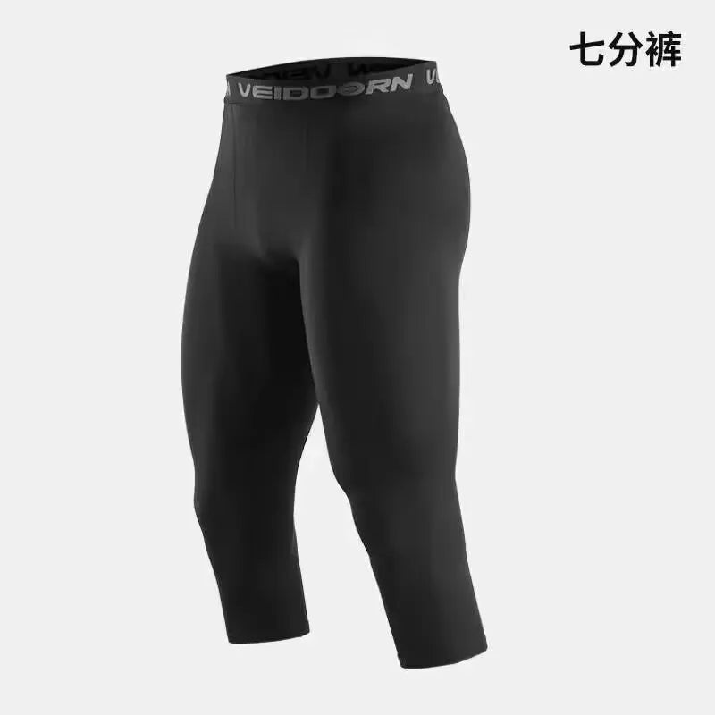 Black men's compression leggings for athletic training shown in a full-length view.