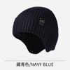 A dark navy blue knitted winter hat shown flat lay.