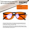 Orange lens blue light blocking glasses shown on a white background