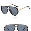 Black sunglasses with gold accents shown in side and positive views.