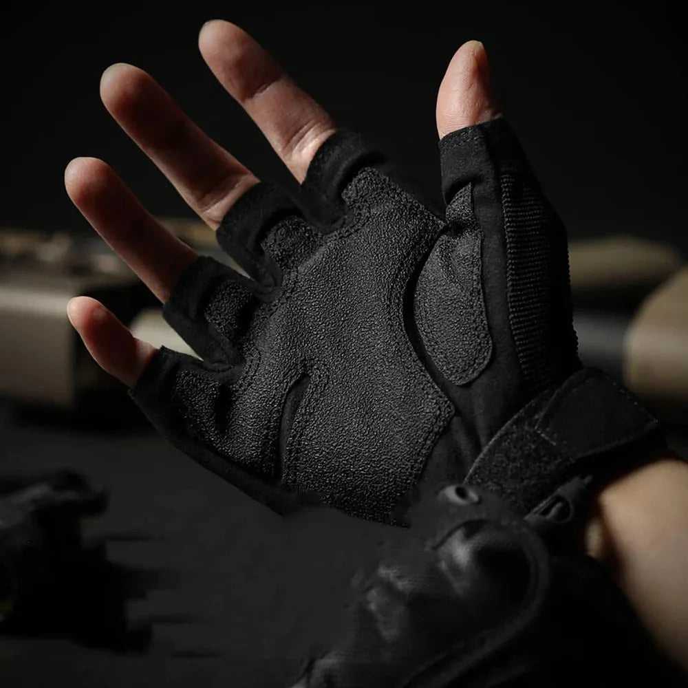 A hand wearing black tactical fingerless gloves is shown in a close-up shot.