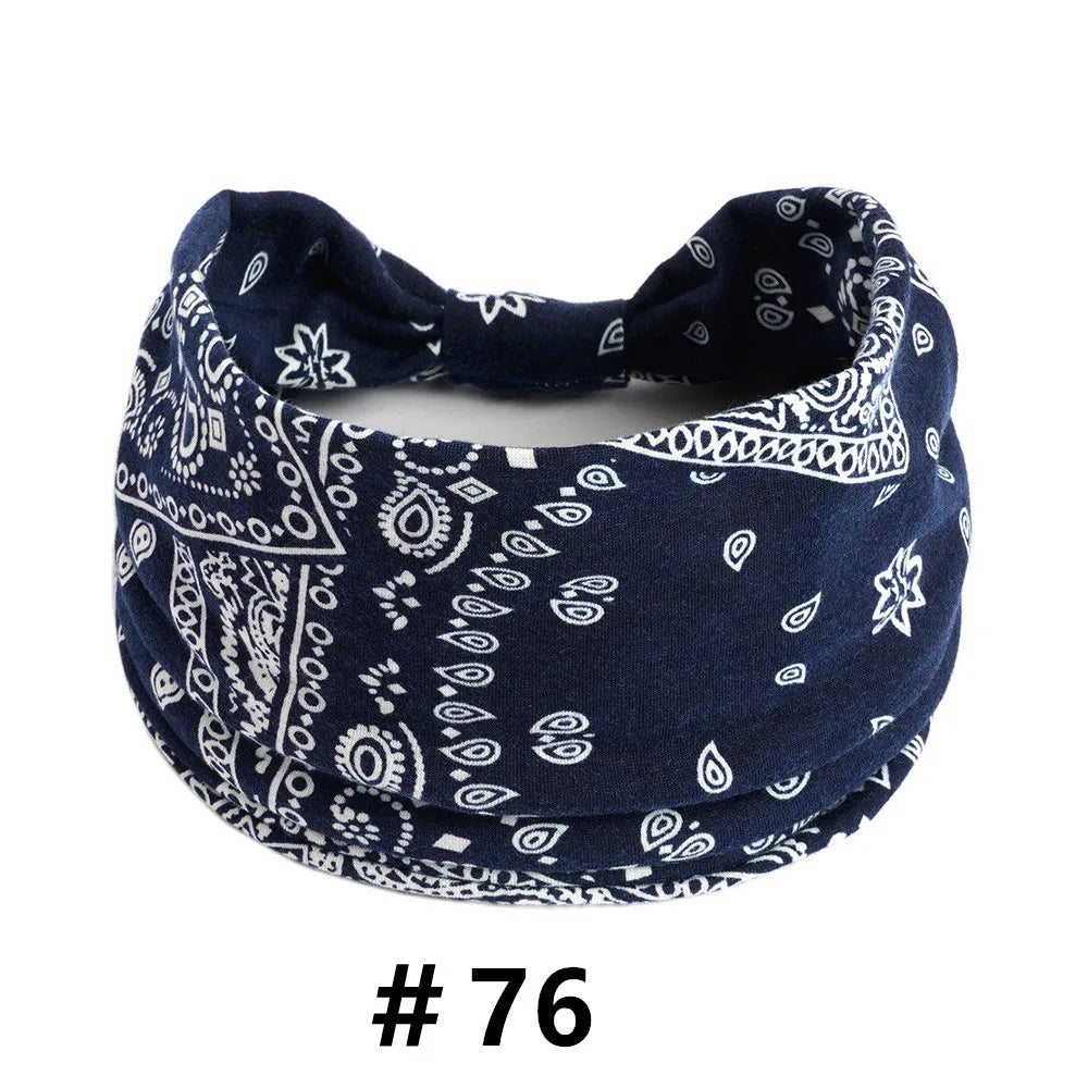 Navy blue boho print cotton headband tied in a bow