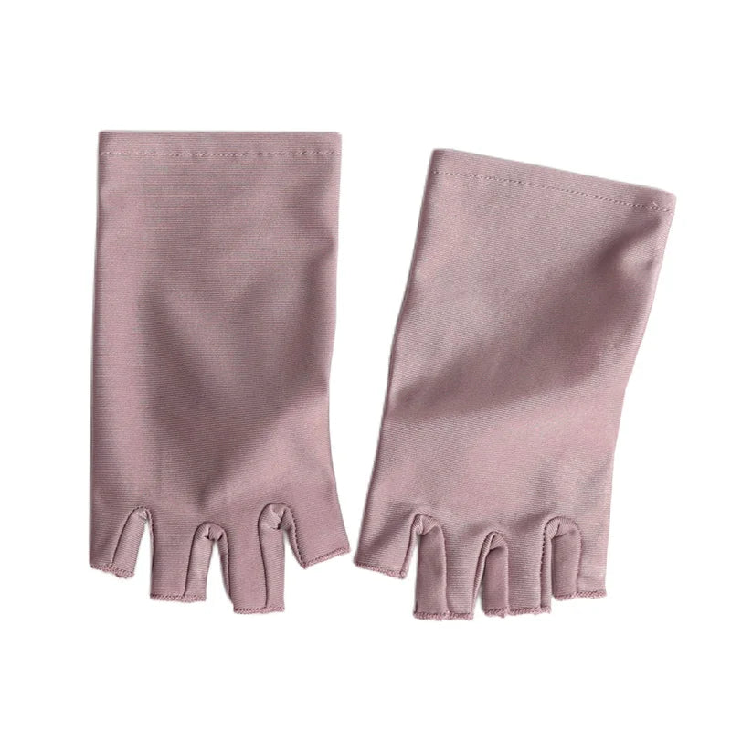 A pair of mauve women's thin stretch elastane gloves shown flat.