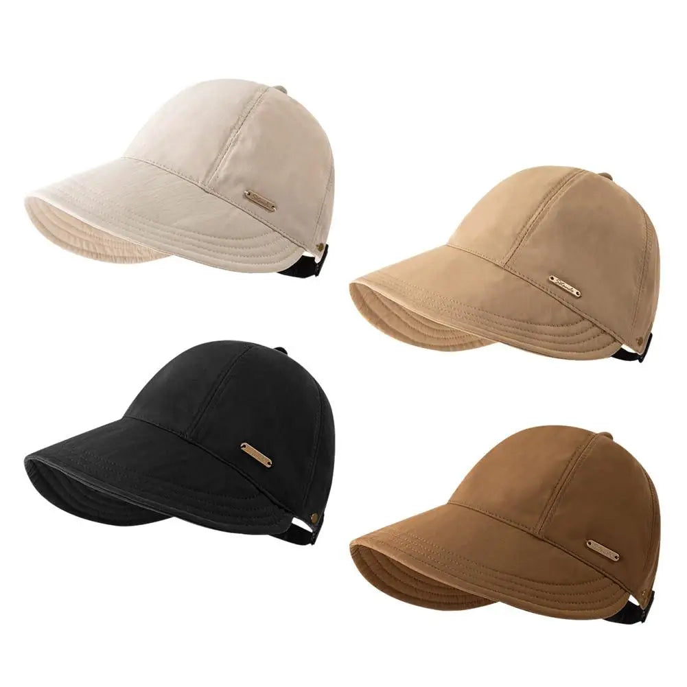 Tres gorras de béisbol en beige, negro y marrón mostradas de lado.