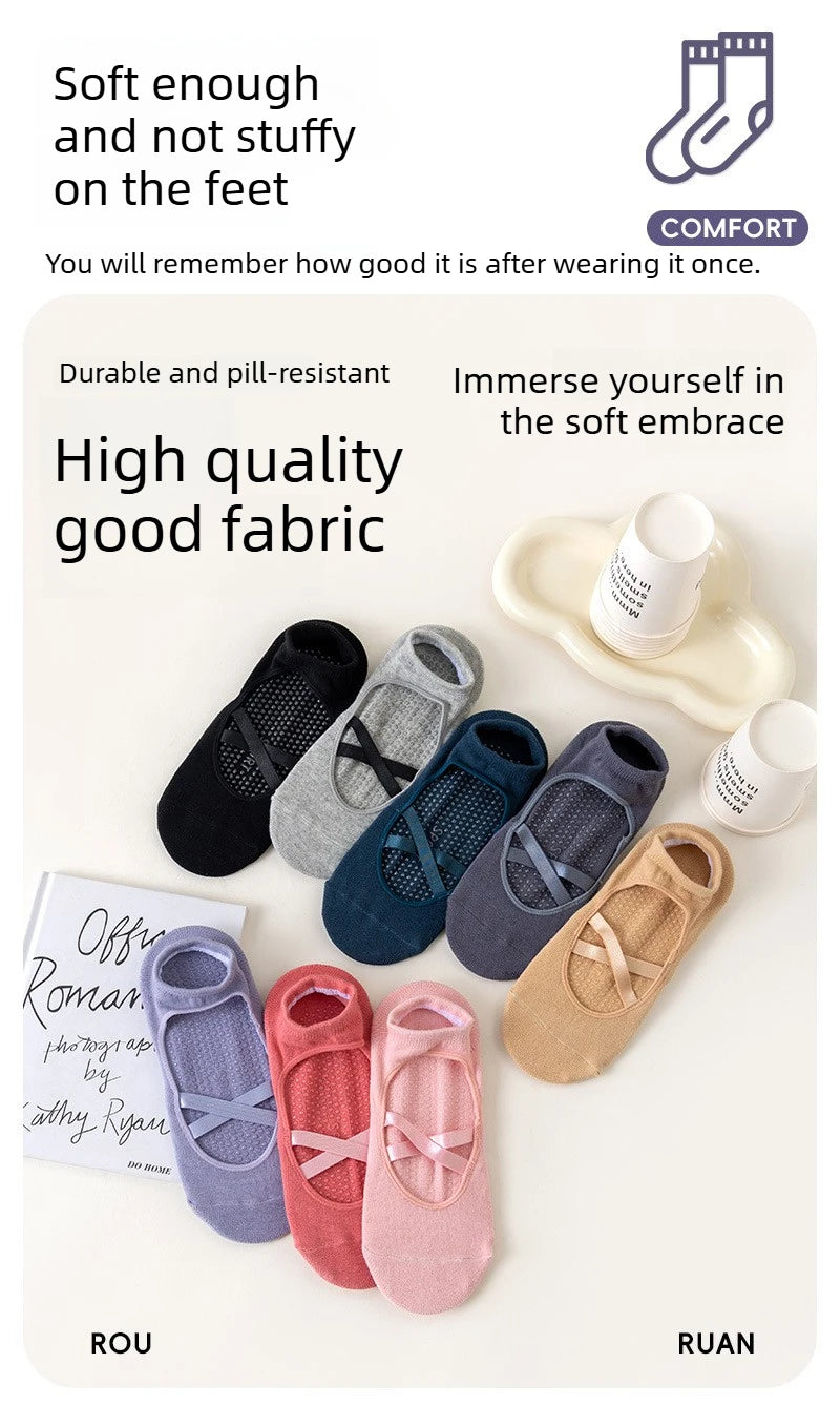 A collection of soft, durable yoga socks in various colors and patterns are displayed on a white background.