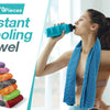 A woman is using a blue instant cooling towel while exercising, with a stack of colorful towels visible.