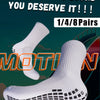 White athletic grip socks shown in a close-up, highlighting the sole design for sports performance.