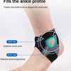 A black ankle brace with inner and outer rings is shown on a person's ankle, demonstrating how it fits the ankle profile.