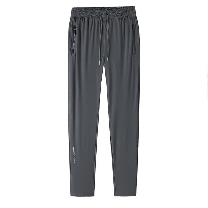 Dark gray men's ice silk performance pants shown flat lay