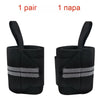 A pair of black heavy duty wrist wraps shown from the side.