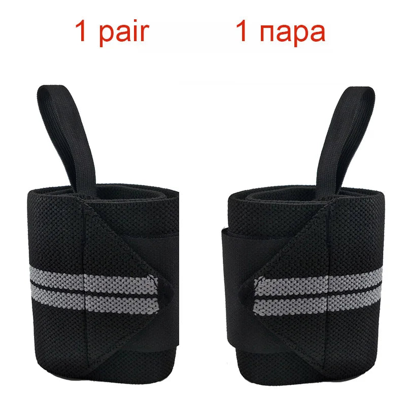 A pair of black heavy duty wrist wraps shown from the side.