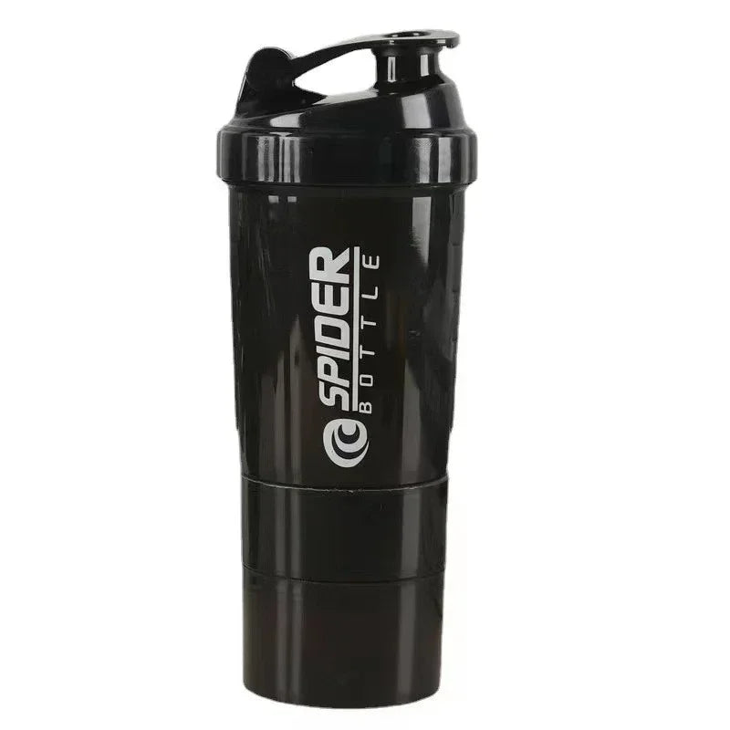 A black portable protein shaker cup with a hinged lid.