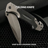 A folding knife with a silver blade and black handle is shown against a dark background.