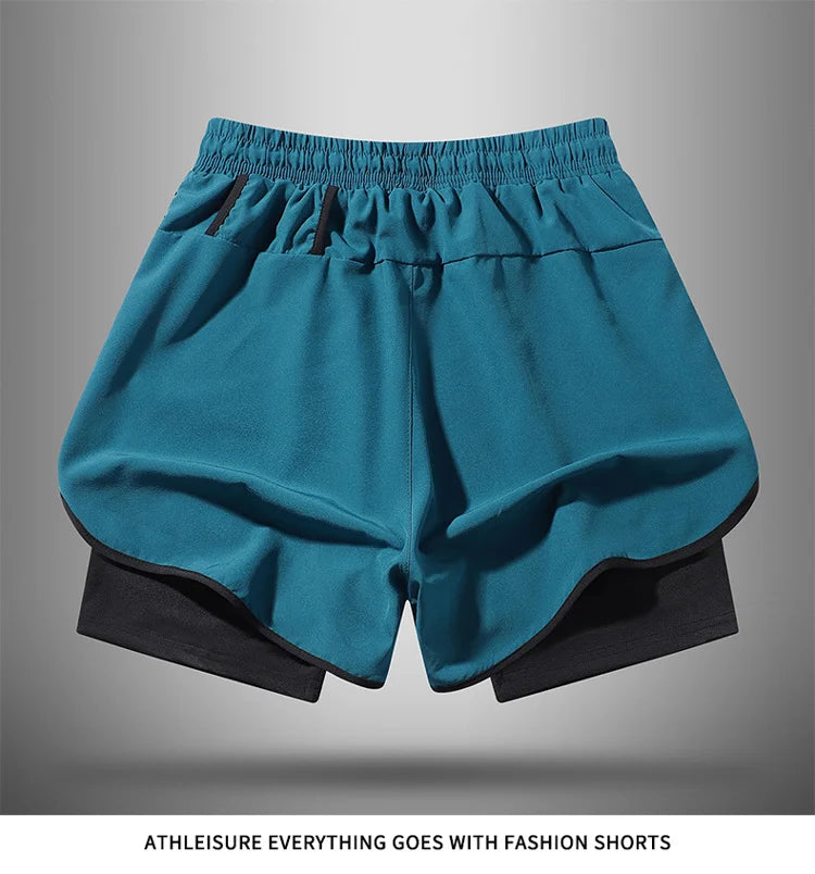 A pair of teal athletic shorts with black trim and a black liner displayed flat.