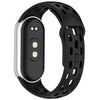 A black silicone smart watch band replacement with a silver casing and multiple holes for breathability.
