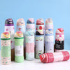 A collection of pink and green vacuum insulated water bottles with straws arranged on a white surface.