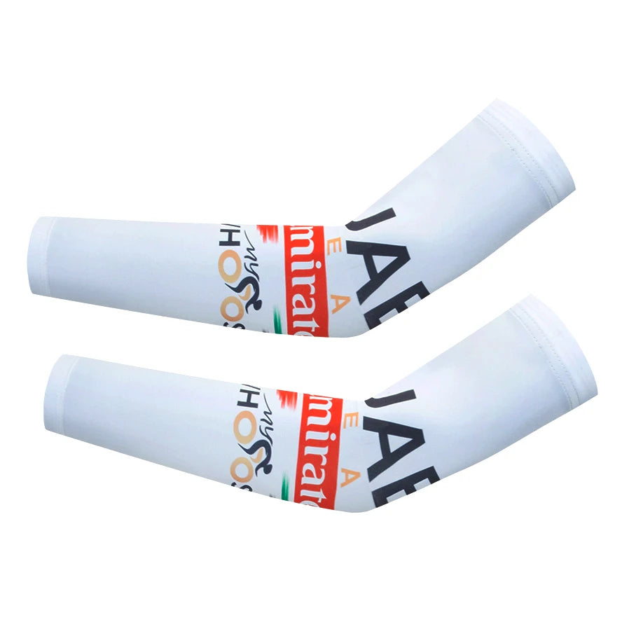Pair of white cycling arm warmers featuring the UAE flag design.