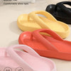 A collection of multi-color optional comfortable platform flip flops in yellow, orange, and pink.