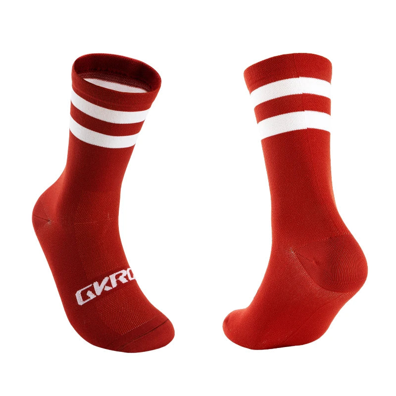 Pair of red cycling socks with white stripes on the leg