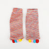 Pair of colorful five-finger yoga socks with striped patterns and multicolored toe ends