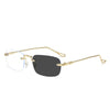 A pair of frameless rectangle blue light blocking glasses with gold accents.
