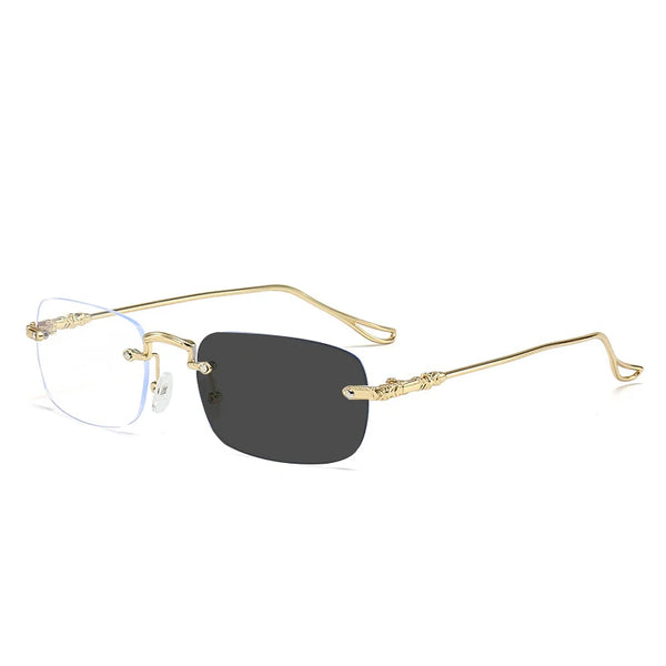 A pair of frameless rectangle blue light blocking glasses with gold accents.