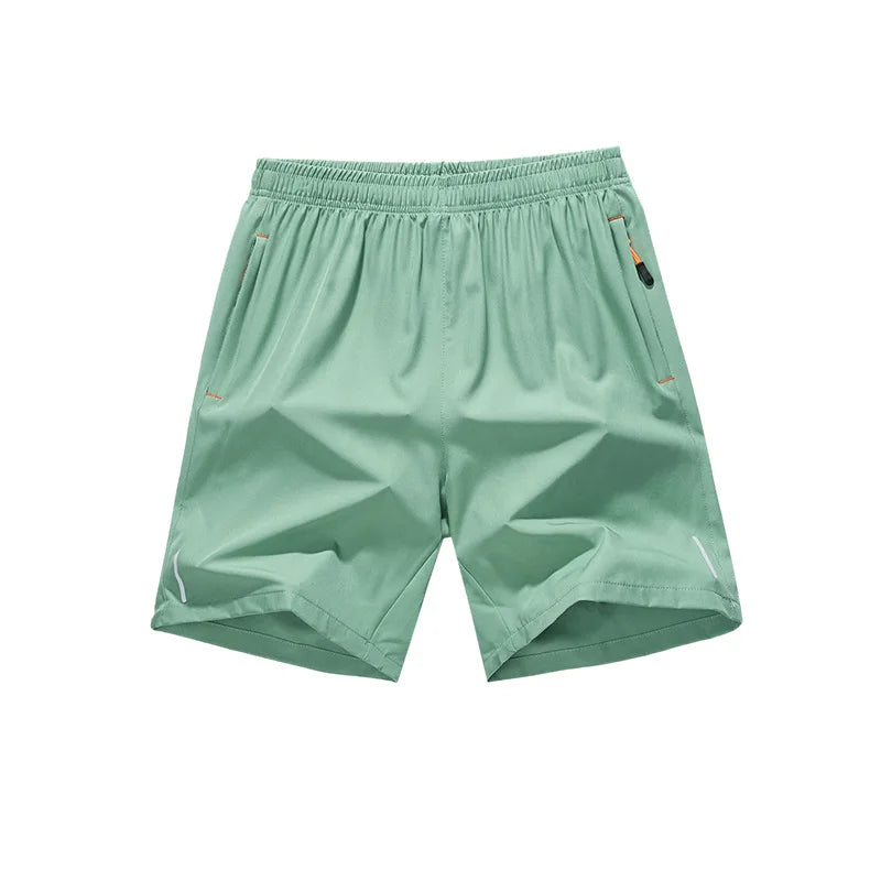 Light mint green men's lightweight quick-dry running shorts laid flat.