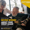A man is playing a guitar while wearing a copper fiber wrist protector for pain relief.