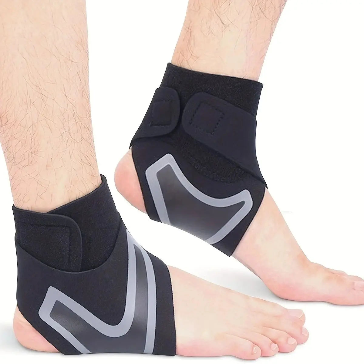 Black ankle sprain support sleeves worn on a person's foot and ankle.